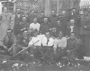 French POWs with guard and farmers family